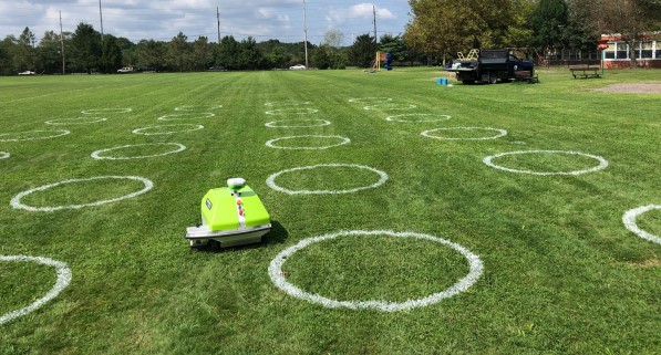 Social distancing bubbles painted by autonomous line marking robot, Turf Tank