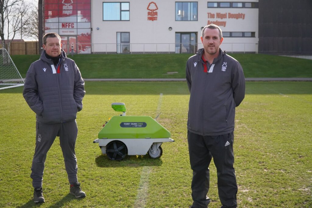 Picture of grounds crew at nottingham forest with their turf tank robot