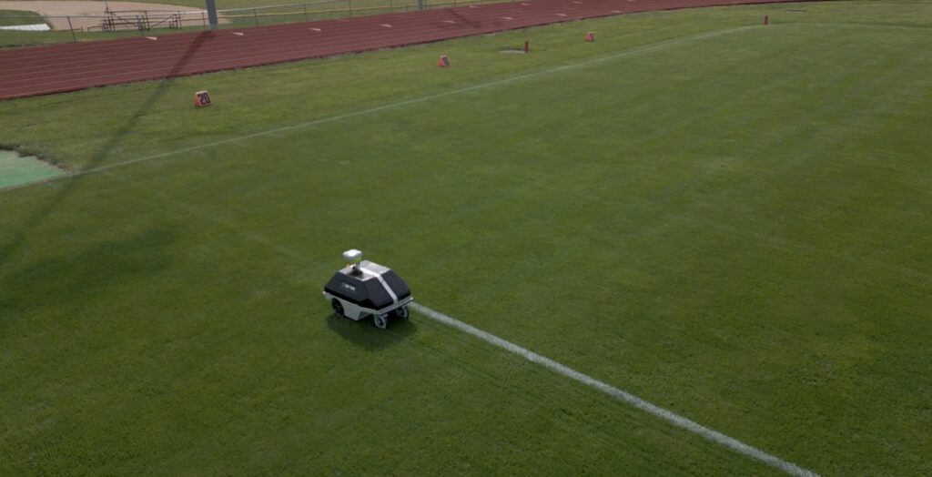 Picture of Turf Tank Robot painting a field at Bowling Green High School