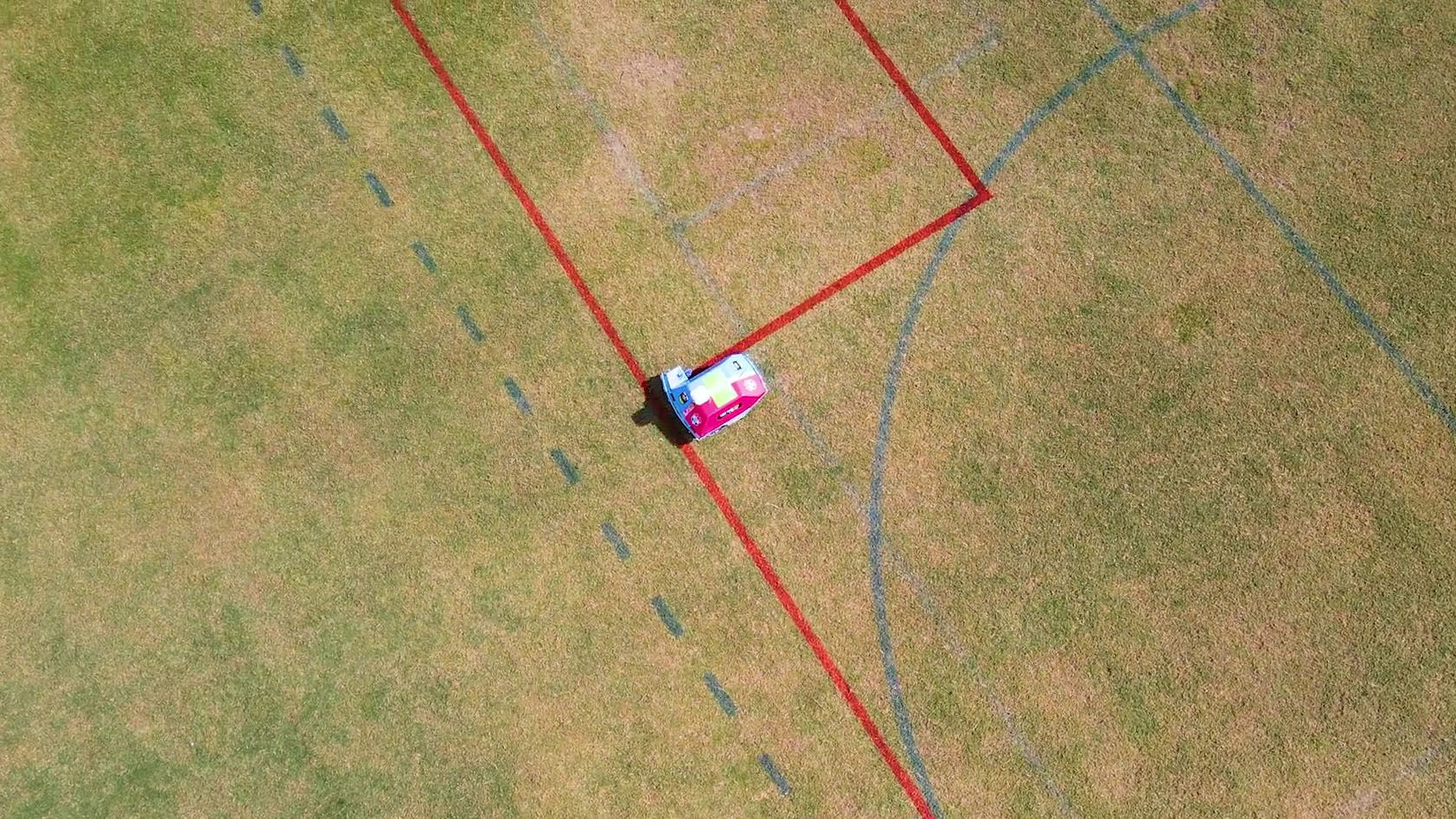 Autonomous line marking robot, Turf Tank, painting red and blue soccer field training lines