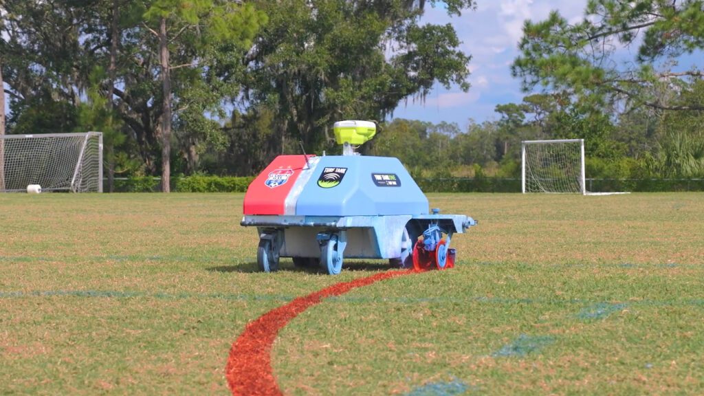 Tampa Bay United's line marking robot painting a soccer field