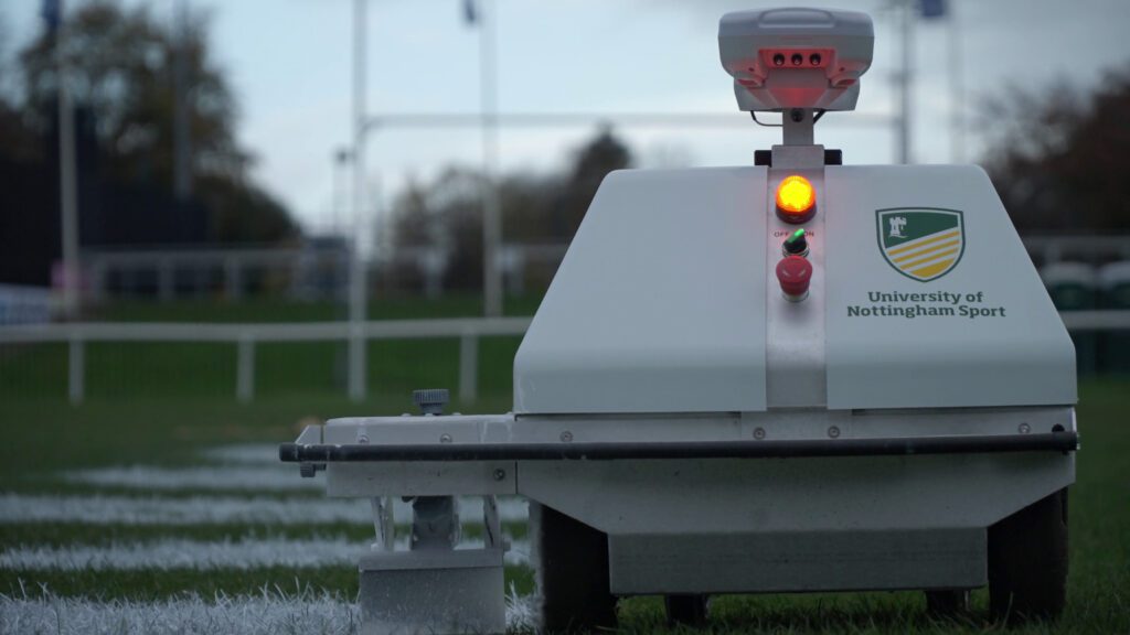 University of nottingham's turf tank robot painting a field. Picture taken from the front