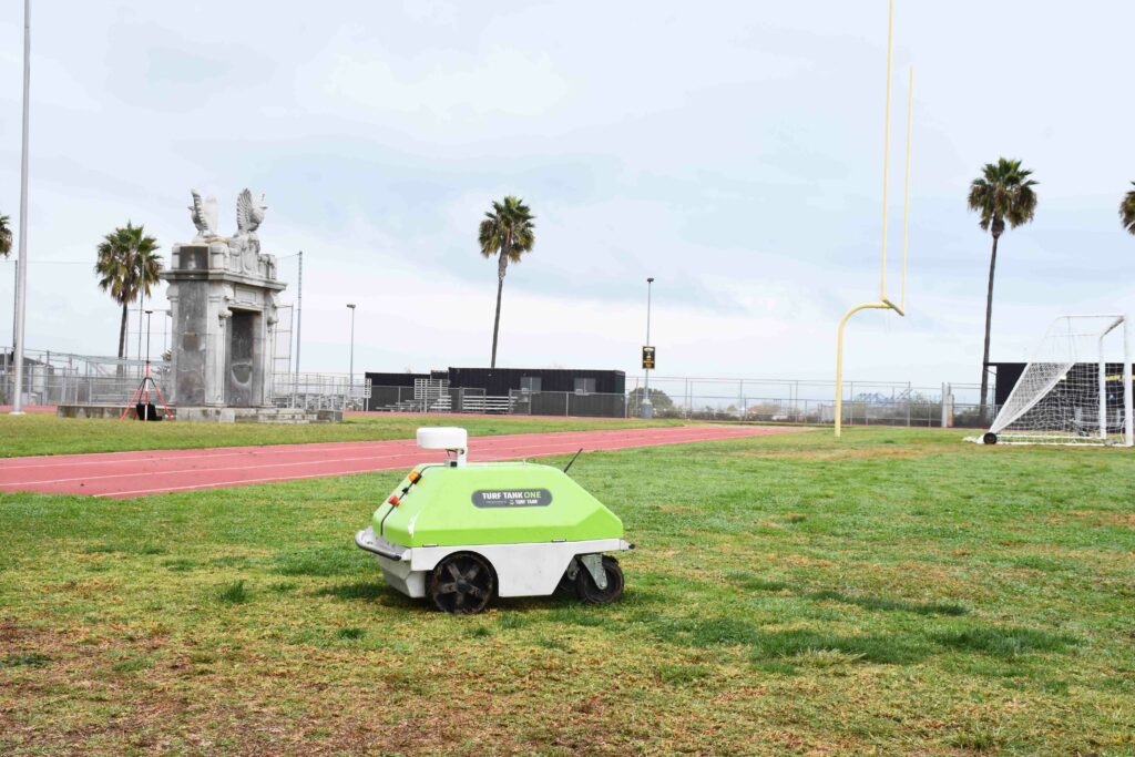 Picture of San Pedro high school's autonomous line marking robot, Turf Tank, on their football field