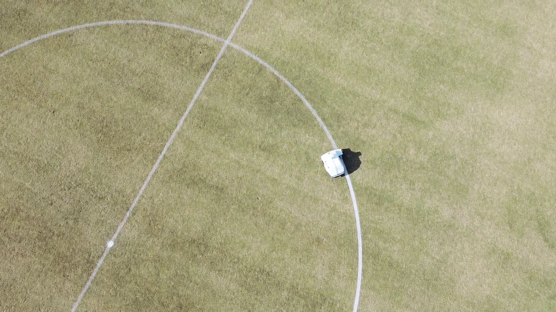 Miracosta turf tank robot painting a mid circle on a soccer field