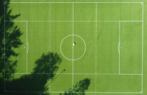 Grid training lines being marked on a soccer pitch by a Turf Tank one plus robot