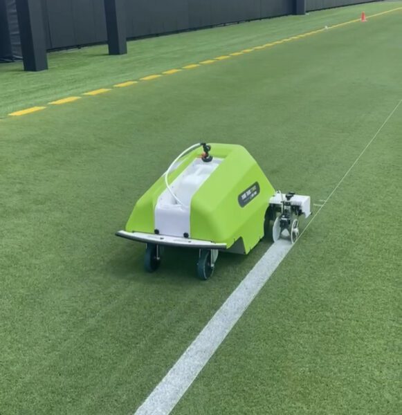 Turf Tank Two robot painting a field on synthetic grass