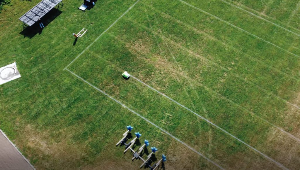 The Turf Tank sports line marking robot painting a football field in Nebraska.